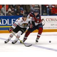 Tri-City Americans Battle Portland Winterhawks for the Puck