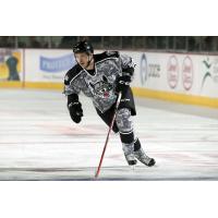 Ty Rattie of the Chicago Wolves Skates against the Grand Rapids Griffins