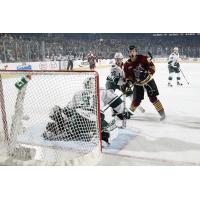 Justin Hodgman of the Chicago Wolves Reacts to a Shot vs. the Iowa Wild