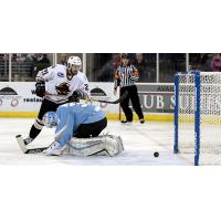 Brock Higgs of the Atlanta Gladiators Scores on Alaska Aces Goaltender Troy Redmann