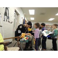 Mississippi RiverKings Defenseman Tim Boyle Signs Autographs for Bailey Station Elementary Students