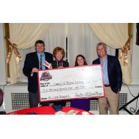 Williamsport Crosscutters Present Check to James V. Brown Library