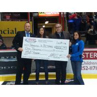 Windsor Spitfires Foundation, Rochester Place Presents Check to Transition to Betterness