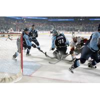 Chicago Wolves RW Zach O'Brien Fights for a Score vs. the Milwaukee Admirals