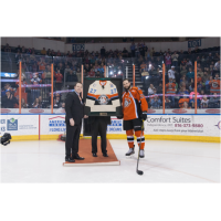 Brent Thiessen Presents Andrew Courtney of the Missouri Mavericks with a Commemorative Jersey