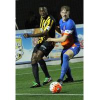 Charleston Battery and FC Cincinnati Race for the Ball
