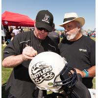 Arizona Rattlers Autograph a Helmet at Fan Fest