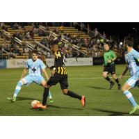 Charleston Battery Race for the Ball vs. the Wilmington Hammerheads