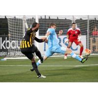 Romario Williams of the Charleston Battery Shoots past the Wilmington Hammerheads
