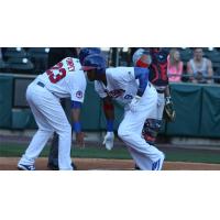 Domonic Brown of the Buffalo Bisons Congratulated by Dalton Pompey