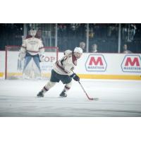 Chicago Wolves RW Ty Rattie Eyes the Puck vs. the Iowa Wild