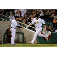 A.J. Reed of the Fresno Grizzlies Crosses the Plate