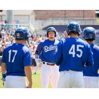 Alex Verdugo of the Tulsa Drillers Receives Congratulations following his Grand Slam