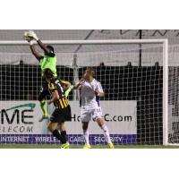 Charleston Battery Goalkeeper Odisnel Cooper catches a Louisville City FC Shot on September 12, 2015