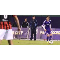 Arizona United Defender Adam West with Louisville City FC