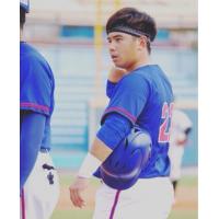 Taiwanese catcher Wei-Chieh (Willy) Chang suiting up for Kainan University