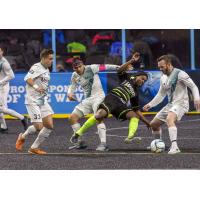 Milwaukee Wave Midfielder Ian Bennett battles for the ball