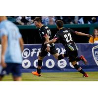 Matt Thomas of Las Vegas Lights FC celebrates scoring the club's first ever goal