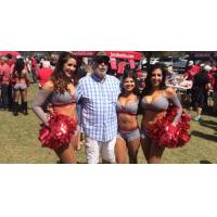 Carolina Cobras cheerleaders and fan