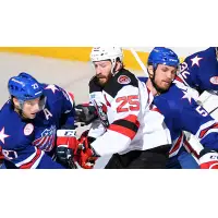 Binghamton Devils Right Wing Nick Lappin battles the Rochester Americans