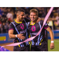 Las Vegas Lights FC Defender Marco Cesar Jaime Jr. (left) congratulates Midfielder Alex Mendoza