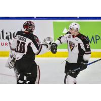 Vancouver Giants Goaltender David Tendeck and Left Wing Owen Hardy