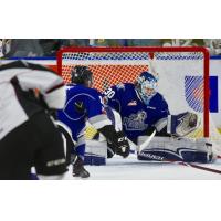 Victoria Royals Goaltender Griffen Outhouse makes a stop against the Vancouver Giants