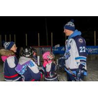 Darren Kramer of the Manitoba Moose instructs kids