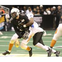 Arizona Rattlers Quarterback Jeff Ziemba fumbles against the Cedar Rapids Titans
