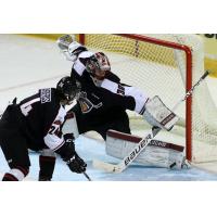 Vancouver Giants Goaltender David Tendeck tips away a Victoria Royals' shot attempt