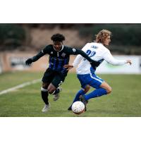 Colorado Springs Switchbacks race to the ball vs. Rio Grande Valley FC