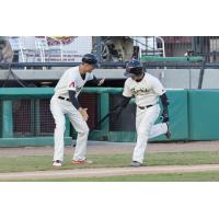 Daulton Varsho of the Visalia Rawhide is congratulated on his second-inning home run