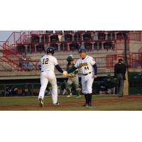Burlington Bees Catcher Harrison Wenson rounds the bases