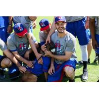 Round Rock Express players with K-9 unit Vada