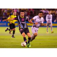 Las Vegas Lights FC's Carlos Alvarez works for possession against Sacramento Republic FC