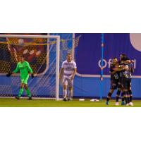 Las Vegas Lights FC's Sammy Ochoa (left) and Marco Cesar Jaime Jr. (center) celebrate Joel Huiqui's goal