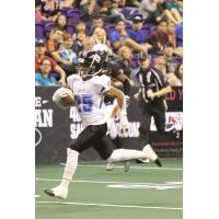 Raphael Lawson-Gayle of the Cedar Rapids Titans races for the endzone