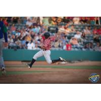 Charleston RiverDogs shortstop Wilkerman Garcia runs to first
