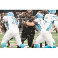 Arizona Rattlers defensive lineman Anttaj Hawthorne tears through the Philadelphia Soul offensive line