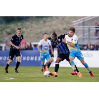 Colorado Springs Switchbacks FC battle Las Vegas Lights FC for possession