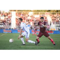 Sacramento Republic FC vies with Reno 1868 FC for possession