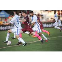 Sacramento Republic FC battles for possession with Reno 1868 FC