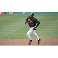 David Washington of the Long Island Ducks rounds the bases