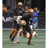 Dezmon Epps of the Arizona Rattlers runs against the Nebraska Danger