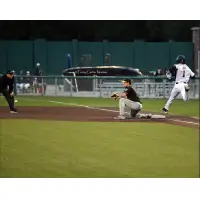 Duluth Huskies beat out a throw to first