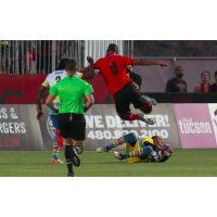Las Vegas Lights FC goalkeeper Ricardo Ferrino makes a sliding stop at Phoenix Rising FC