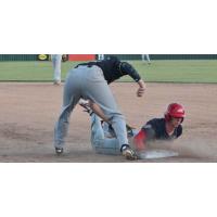 A close play for the Acadiana Cane Cutters