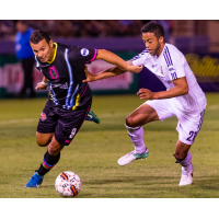 Las Vegas Lights FC midfielder Carlos Alvarez eyes the ball