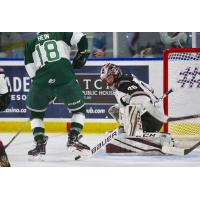 Vancouver Giants goaltender David Tendeck blocks the Everett Silvertips