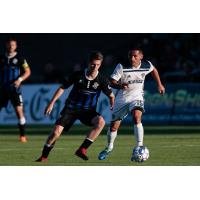 Colorado Springs Switchbacks jockey for the ball against Fresno FC